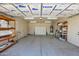Spacious two car garage with ample storage, well-lit with shelving units at 4112 N 4Th Ave, Phoenix, AZ 85013