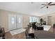 Bright living room boasts lots of natural light, ceiling fan, and a neutral color palette at 4112 N 4Th Ave, Phoenix, AZ 85013
