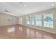Bright open living room featuring many windows and new flooring, creating an airy atmosphere at 4112 N 4Th Ave, Phoenix, AZ 85013
