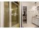 Cozy bathroom with a glass door shower and view to bedroom at 5221 E Mills Ct, Mesa, AZ 85215