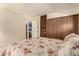 Comfortable bedroom with large wardrobe and closet, and adjacent to bathroom at 5221 E Mills Ct, Mesa, AZ 85215