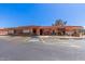 Inviting community center with dedicated disabled parking spaces, desert landscaping, and a welcoming entrance at 5221 E Mills Ct, Mesa, AZ 85215
