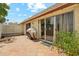 A private outdoor patio with tile flooring and sliding glass doors at 5224 S Monaco Dr, Tempe, AZ 85283