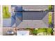 Aerial view of a residential area showcasing rooftops, landscaping, and neighborhood layout at 5533 E Earll Dr, Phoenix, AZ 85018