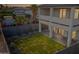 Elegant home with a private backyard featuring new sod, modern patio design, and privacy fencing at 5533 E Earll Dr, Phoenix, AZ 85018