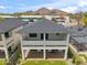 An aerial shot of the house highlighting the balcony and the mountain views at 5537 E Earll Dr, Phoenix, AZ 85018