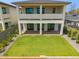 Aerial view showcasing the spacious backyard and covered patio of this modern home at 5537 E Earll Dr, Phoenix, AZ 85018