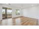Spacious bedroom with sliding glass doors to a balcony and large windows, offering serene views at 5537 E Earll Dr, Phoenix, AZ 85018