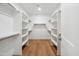 Walk-in closet with custom shelving and ample storage space for an organized wardrobe at 5537 E Earll Dr, Phoenix, AZ 85018