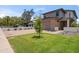 Charming two-story home featuring manicured landscaping, a paver driveway, and modern architecture at 5537 E Earll Dr, Phoenix, AZ 85018
