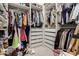 Walk-in closet with built-in organizers, shelving, and ample storage for clothing and accessories at 6518 W Louise Dr, Glendale, AZ 85310