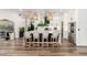 Stylish kitchen with a center island, bar seating, and sleek appliances at 6518 W Louise Dr, Glendale, AZ 85310