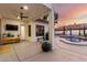 The covered patio provides a relaxing space with a ceiling fan and easy access to the backyard at 6518 W Louise Dr, Glendale, AZ 85310