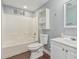 Bathroom showcasing the toilet, sink and combination shower and bathtub at 6812 N Polk St # 223, Phoenix, AZ 85043