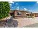 A single-story home with covered parking and low-maintenance desert landscaping at 6812 N Polk St # 223, Phoenix, AZ 85043