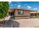 Front exterior of a single story home with desert landscaping and covered parking at 6812 N Polk St # 223, Phoenix, AZ 85043