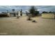 Expansive backyard featuring gravel landscaping, a shed, and block wall fencing for added privacy and security at 6832 W Vogel Ave, Peoria, AZ 85345