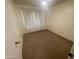 Clean bedroom offers neutral carpeting and natural light through its window, creating a relaxing environment at 6832 W Vogel Ave, Peoria, AZ 85345