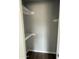 A closet featuring installed shelves and hardwood floor in a modern design at 7007 S 45Th Pl, Phoenix, AZ 85042