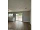 Open living area with sliding glass doors leading to the backyard patio at 7007 S 45Th Pl, Phoenix, AZ 85042