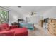 Spacious primary bedroom with a ceiling fan, sitting area, and large windows at 726 E Rose Marie Ln, Phoenix, AZ 85022