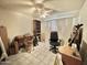 Office room featuring tile flooring, a ceiling fan, and a bright window at 8502 N 26Th Ave, Phoenix, AZ 85021