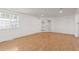 Cozy living room with wood floors and glass patio doors at 8823 E Billings St, Mesa, AZ 85207
