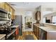 Spacious kitchen with stainless steel appliances and wood flooring at 110 E Saddle Way, San Tan Valley, AZ 85143