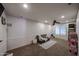 Neutral bonus room featuring carpet flooring, a ceiling fan, and a window letting in natural light at 11746 W Camino Vivaz --, Sun City, AZ 85373
