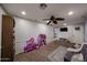 The bonus room is spacious and includes ceiling fan, and gray scale carpet at 11746 W Camino Vivaz --, Sun City, AZ 85373
