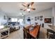 Spacious open floor plan featuring a cozy living room, dining area and lots of natural light at 11746 W Camino Vivaz --, Sun City, AZ 85373
