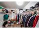 Walk-in closet featuring ample hanging space, shelving, and plenty of room for storage at 11746 W Camino Vivaz --, Sun City, AZ 85373