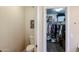 View into a walk-in closet space with lots of clothing storage at 11746 W Camino Vivaz --, Sun City, AZ 85373