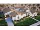 Stunning home showcasing a desert landscape, complemented by a tan tile roof and meticulous landscaping at 11823 N 76Th Way, Scottsdale, AZ 85260