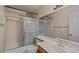 Clean bathroom featuring a shower-tub combination and ample counter space at 1402 E Guadalupe Rd # 215, Tempe, AZ 85283