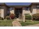 Inviting two-story condo with well-maintained landscaping and stair access to upper units at 1402 E Guadalupe Rd # 215, Tempe, AZ 85283