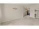 Bright living room featuring neutral carpet, and access to other rooms at 1402 E Guadalupe Rd # 215, Tempe, AZ 85283