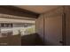 Covered patio with a storage closet and views of the community at 1402 E Guadalupe Rd # 215, Tempe, AZ 85283