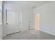 Bedroom features a closet, window and doorway leading to the bathroom at 15018 W Buckskin Trl, Surprise, AZ 85387