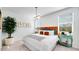 Beautifully decorated bedroom with patterned wallpaper, a stylish bed, and plenty of natural light from large windows at 15018 W Buckskin Trl, Surprise, AZ 85387