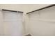 Walk-in closet with clothing racks and carpet at 15018 W Buckskin Trl, Surprise, AZ 85387