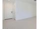 Bright entryway with white walls and tiled floor, with front door at 15018 W Buckskin Trl, Surprise, AZ 85387