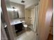 Bright bathroom with step-in shower, decorative tiles, and updated fixtures at 1718 E Gaylon Dr, Tempe, AZ 85282