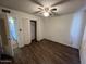 Bedroom with ceiling fan and laminate floors at 1718 E Gaylon Dr, Tempe, AZ 85282