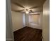 Bright bedroom with ceiling fan and laminate floors at 1718 E Gaylon Dr, Tempe, AZ 85282