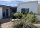 Charming home featuring low maintenance landscaping and red flowering shrubs in the front yard at 1718 E Gaylon Dr, Tempe, AZ 85282