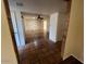 Open living room with tile floors and view to another room at 1718 E Gaylon Dr, Tempe, AZ 85282