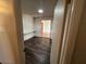 Office with built-in shelving and laminate floors at 1718 E Gaylon Dr, Tempe, AZ 85282