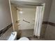 Step-in shower stall with support bar and built in shelving in bathroom at 1718 E Gaylon Dr, Tempe, AZ 85282