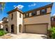 Beautiful home with a two car garage and desert landscaping at 18525 W Valerie Dr, Surprise, AZ 85374
